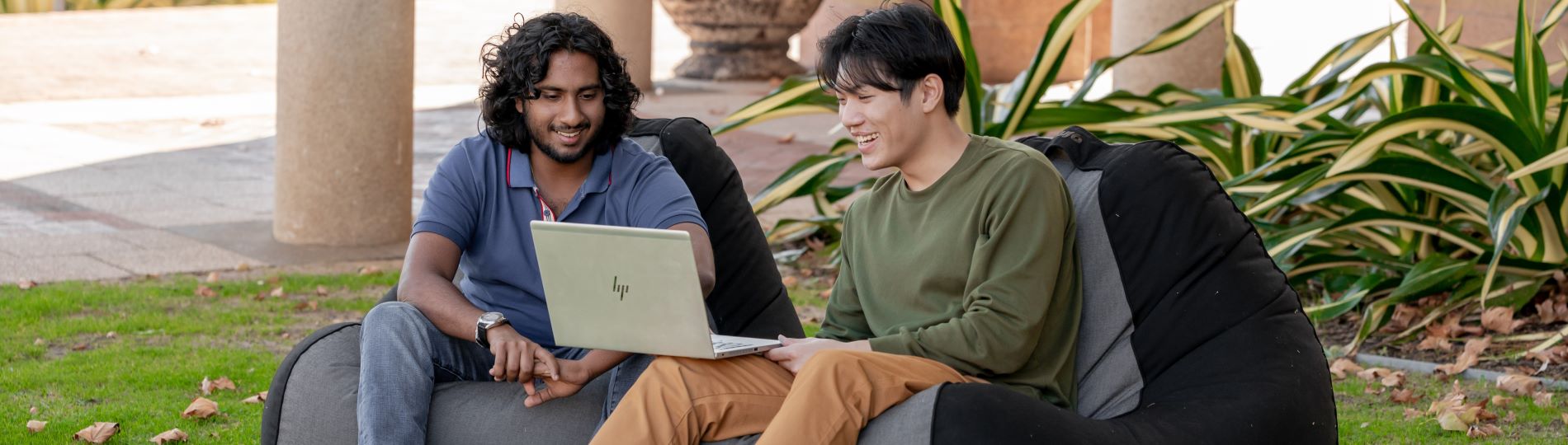 Students sharing a laptop