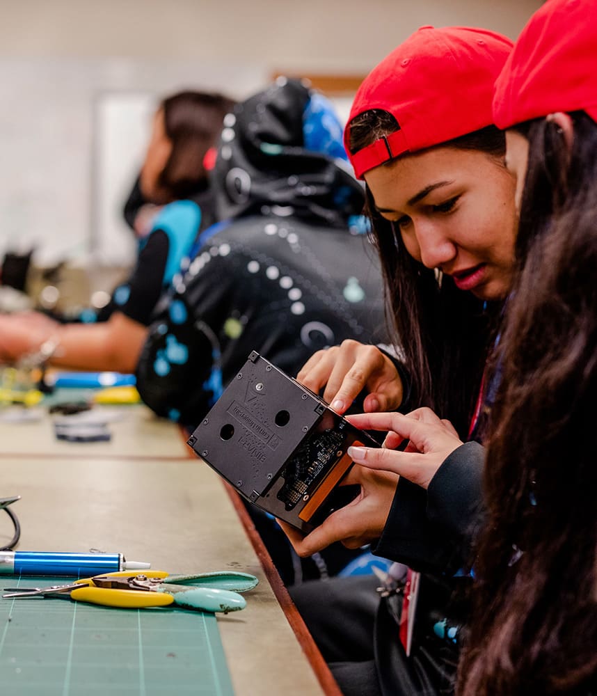 Two young students doing a STEM activity
