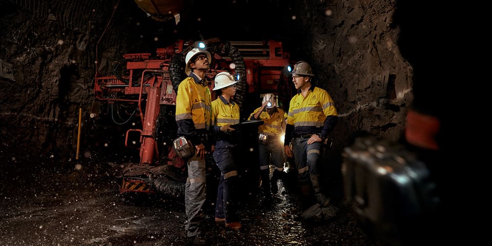 Underground miners at work