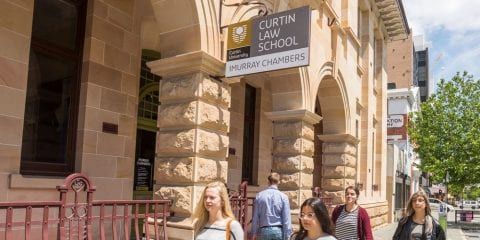 Students walking past Murray street