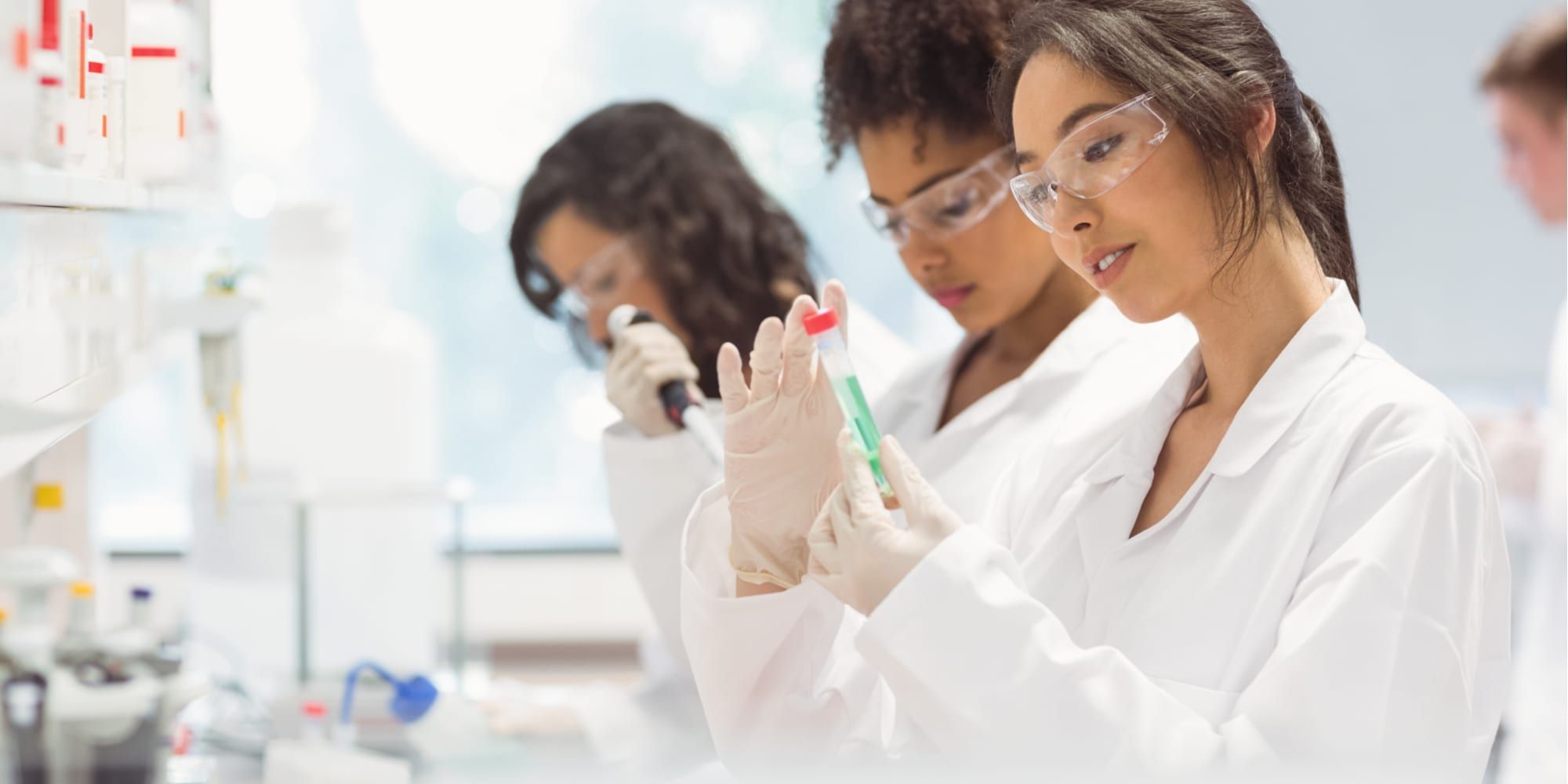3 female students working in a lab