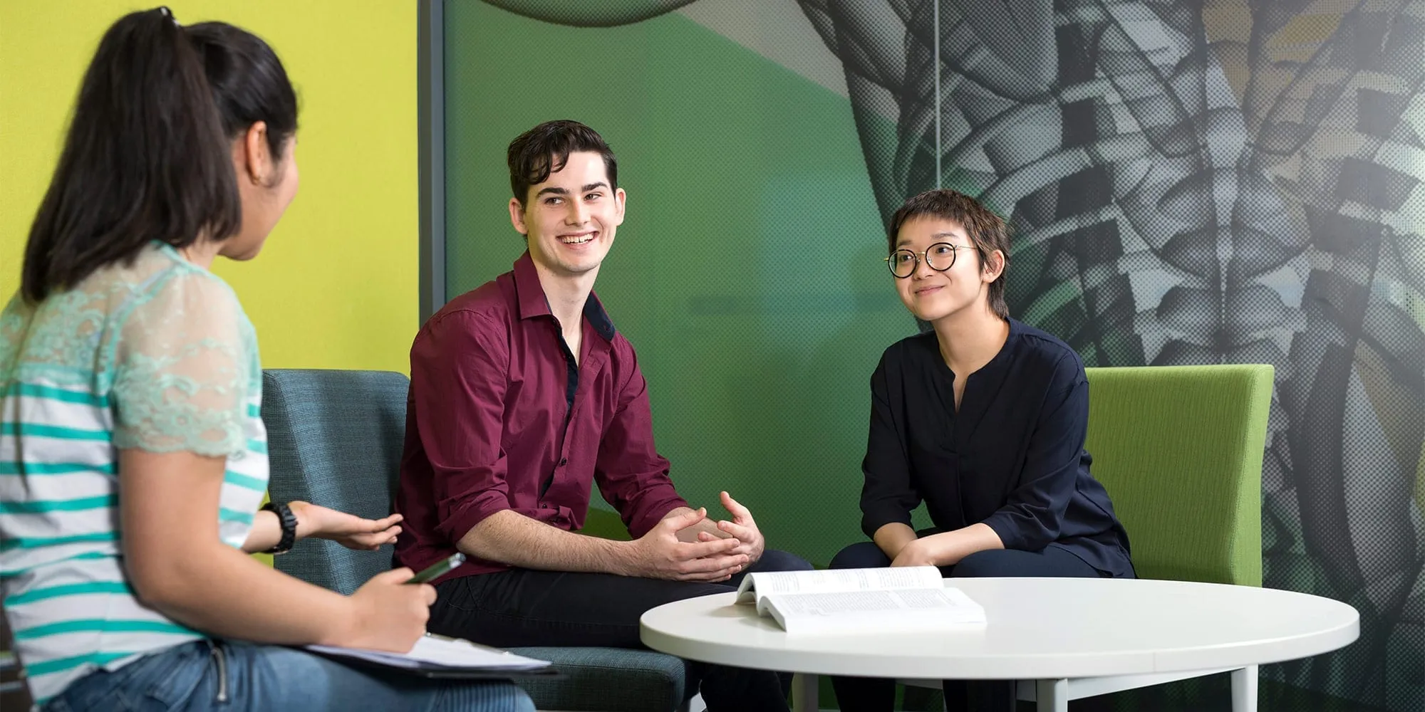Psychology students sitting at a table