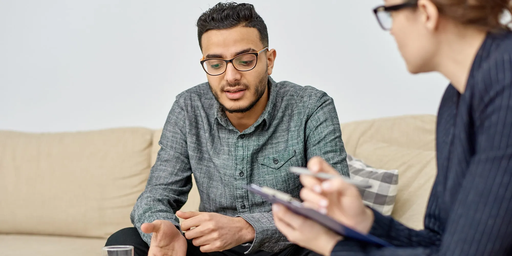 Speech pathology student with patient in clinic