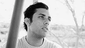 Black and white portrait of Curtin photography graduate Tim Palman