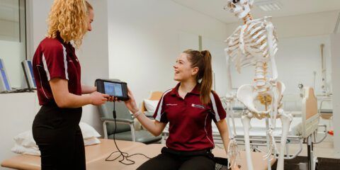 Allied health students in a treatment room