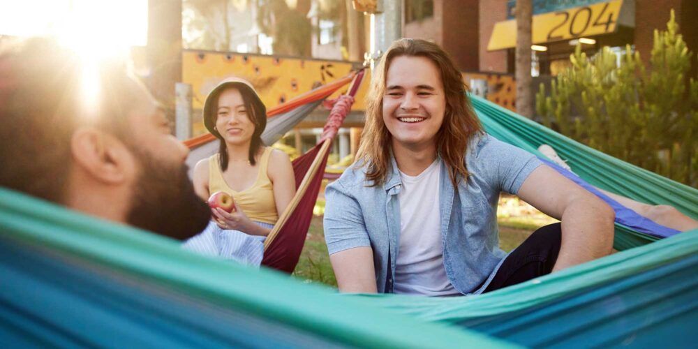 Students on hammocks outside building 204