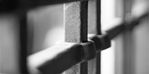 Bars enclosing a jail cell