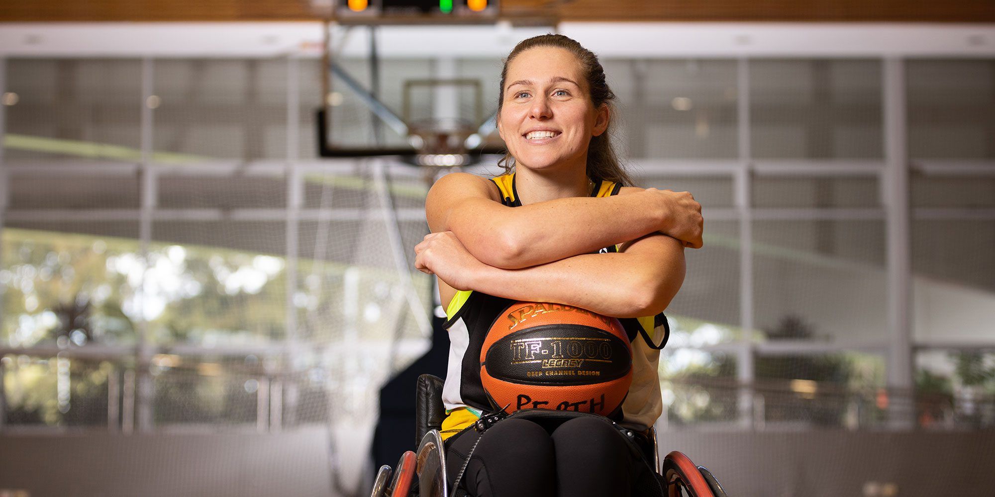 female basketball athlete in wheelchair