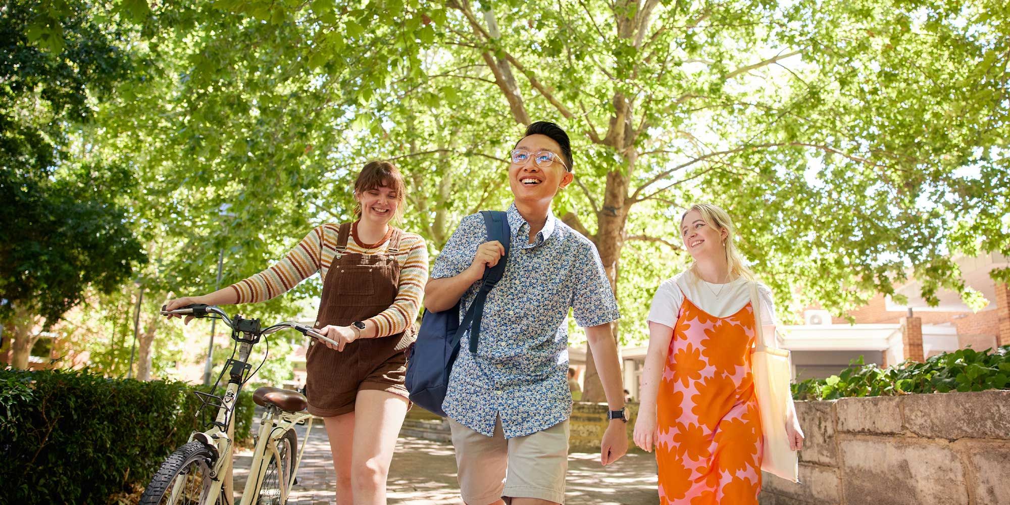 Three students walking