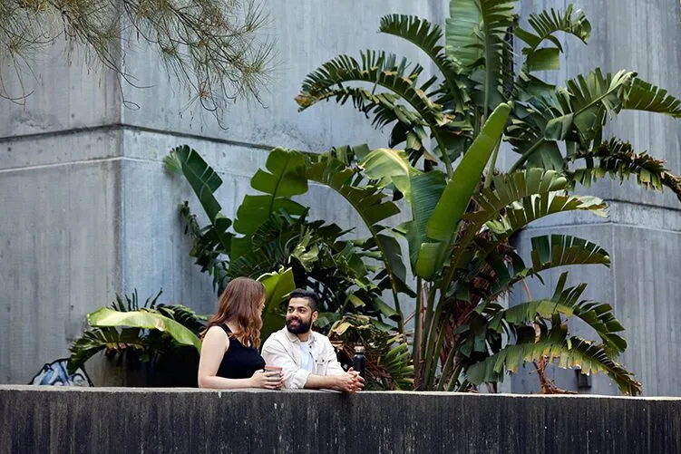 students standing in front of a building and plants at curtin university