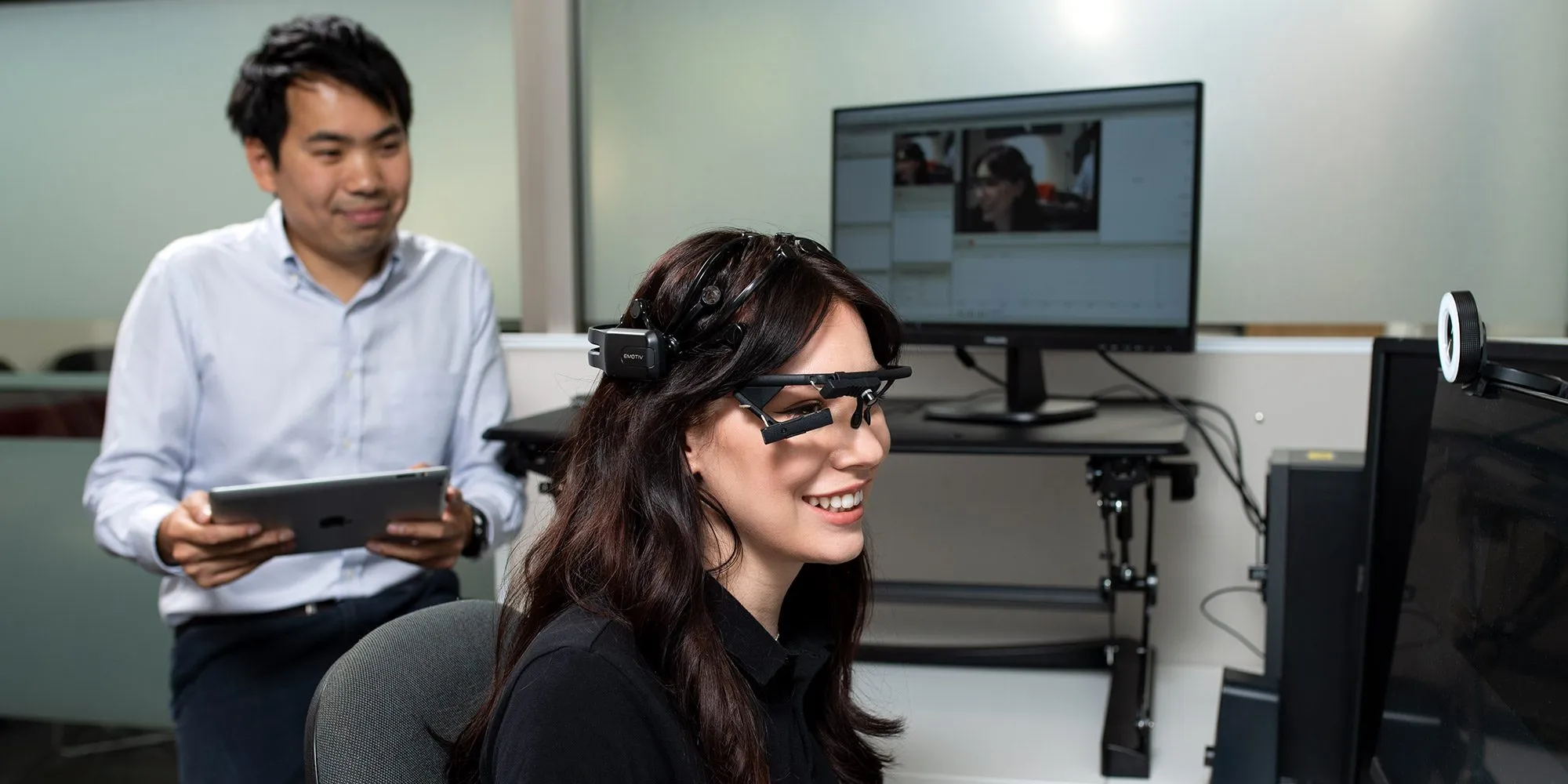 Professor Billy Sung and a student in the consumer research lab