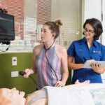 Student nurse and supervisor examining patient at Curtin Medical School