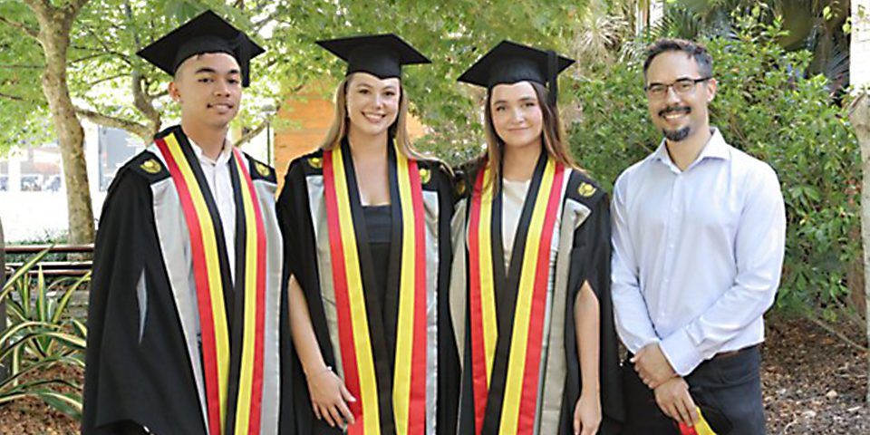 Curtin Medical School graduates Jaaron Davis, Arkayla McPhee and Daisy Alps with Curtin Deputy VC, Indigenous Jonathan Bullen