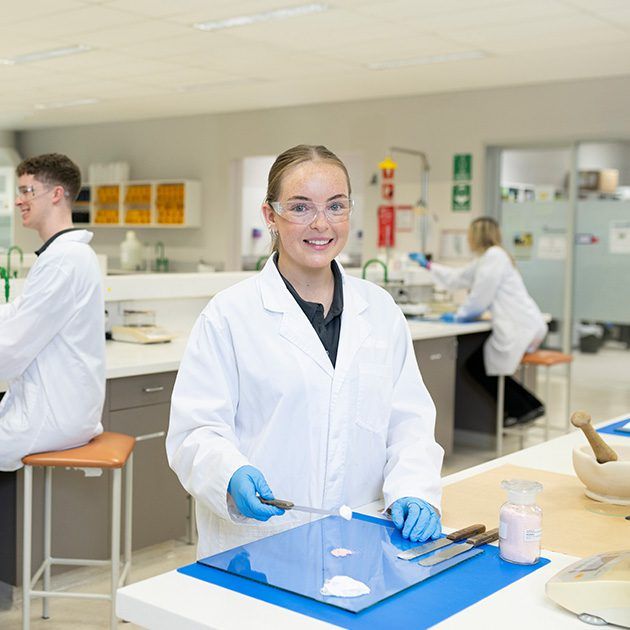 Pharmacy student compounding