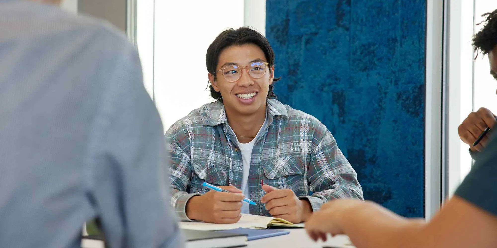 Student with notebook open