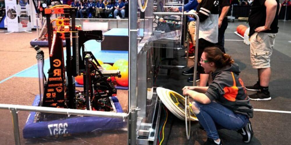 Student competing in a robotics competition