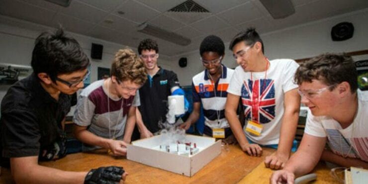 A group of students working on a project together