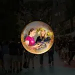 Curtin Open Day 2026: Students reading a brochure, depicted in a golden bubble against a black background.