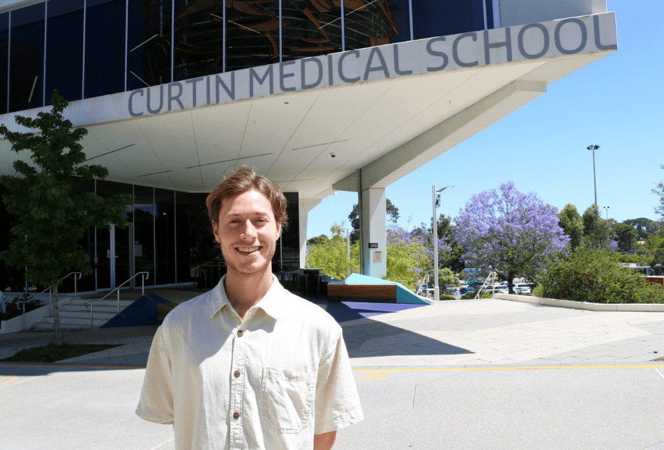 Curtin graduate James Leigh standing out front of Curtin Medical School