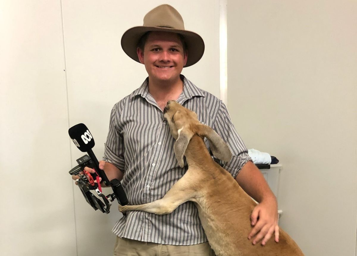 Dylan Storer with a kangaroo