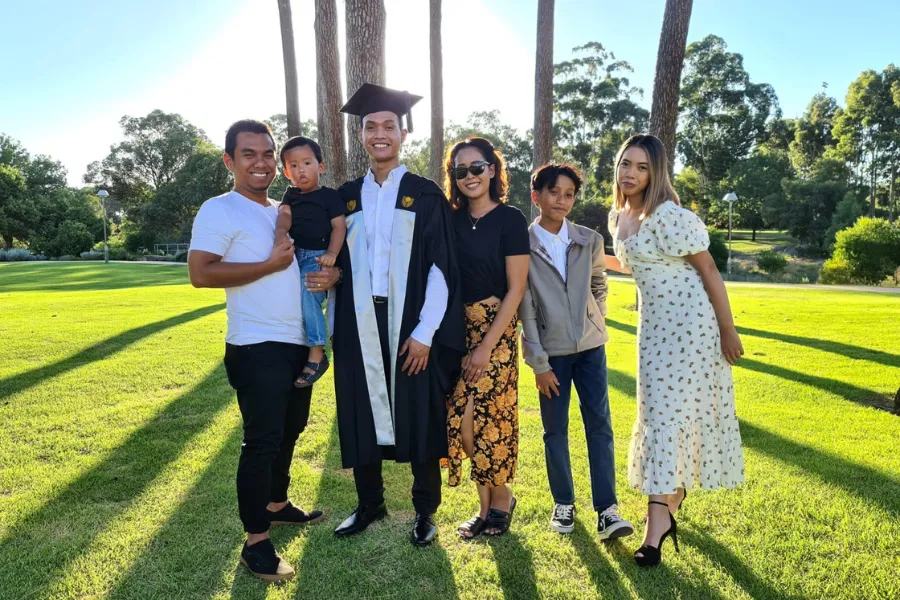 Khai with family at graduation