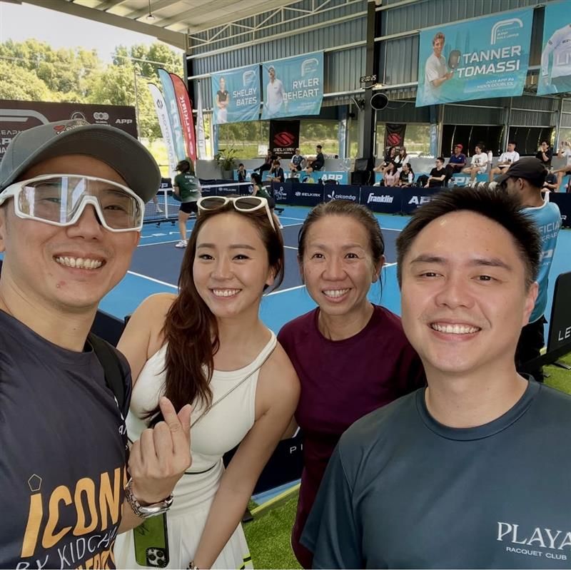 kid chan with friends at pickleball event