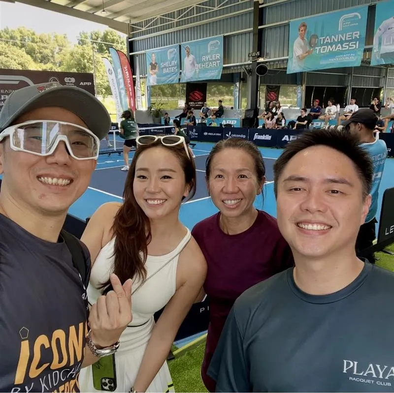 kid chan with friends at pickleball event
