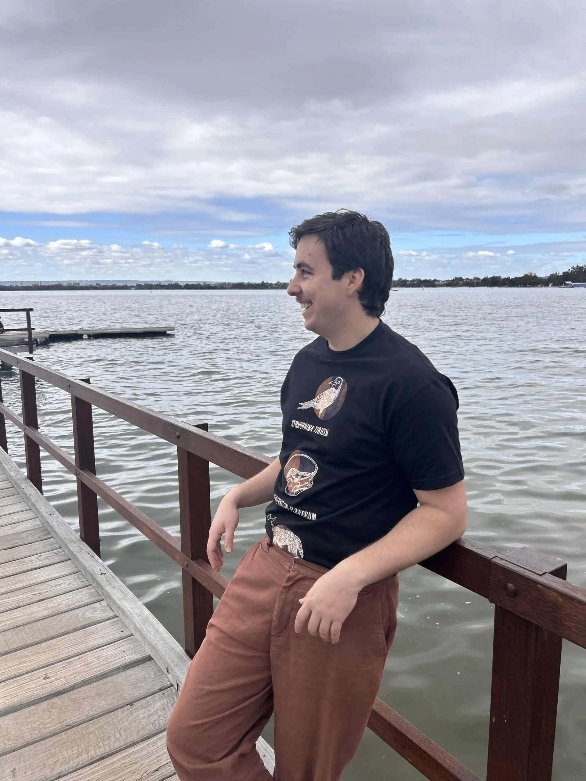 curtin graphic design graduate will peucker on the jetty smiling