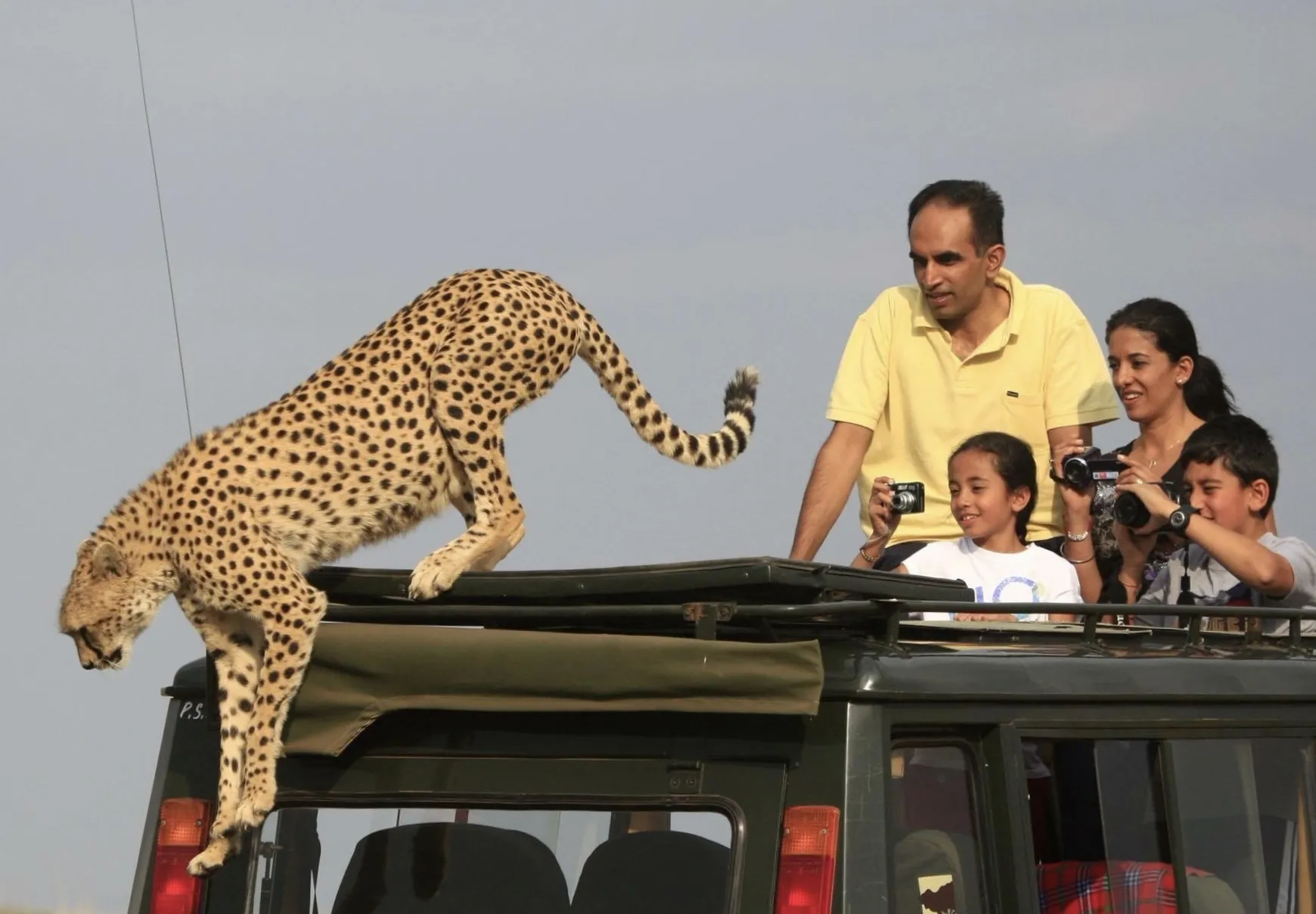 curtin graduate harman heer with his family on safari