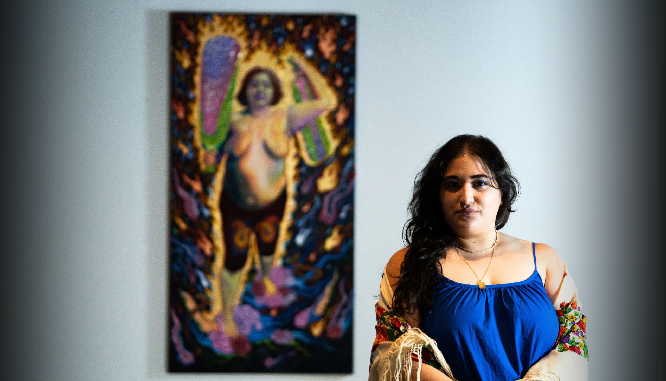 curtin graduate yasamin khadembashi with her artwork immoral warrior
