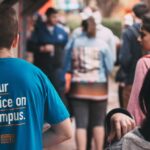 Student guild officer standing in a crowd