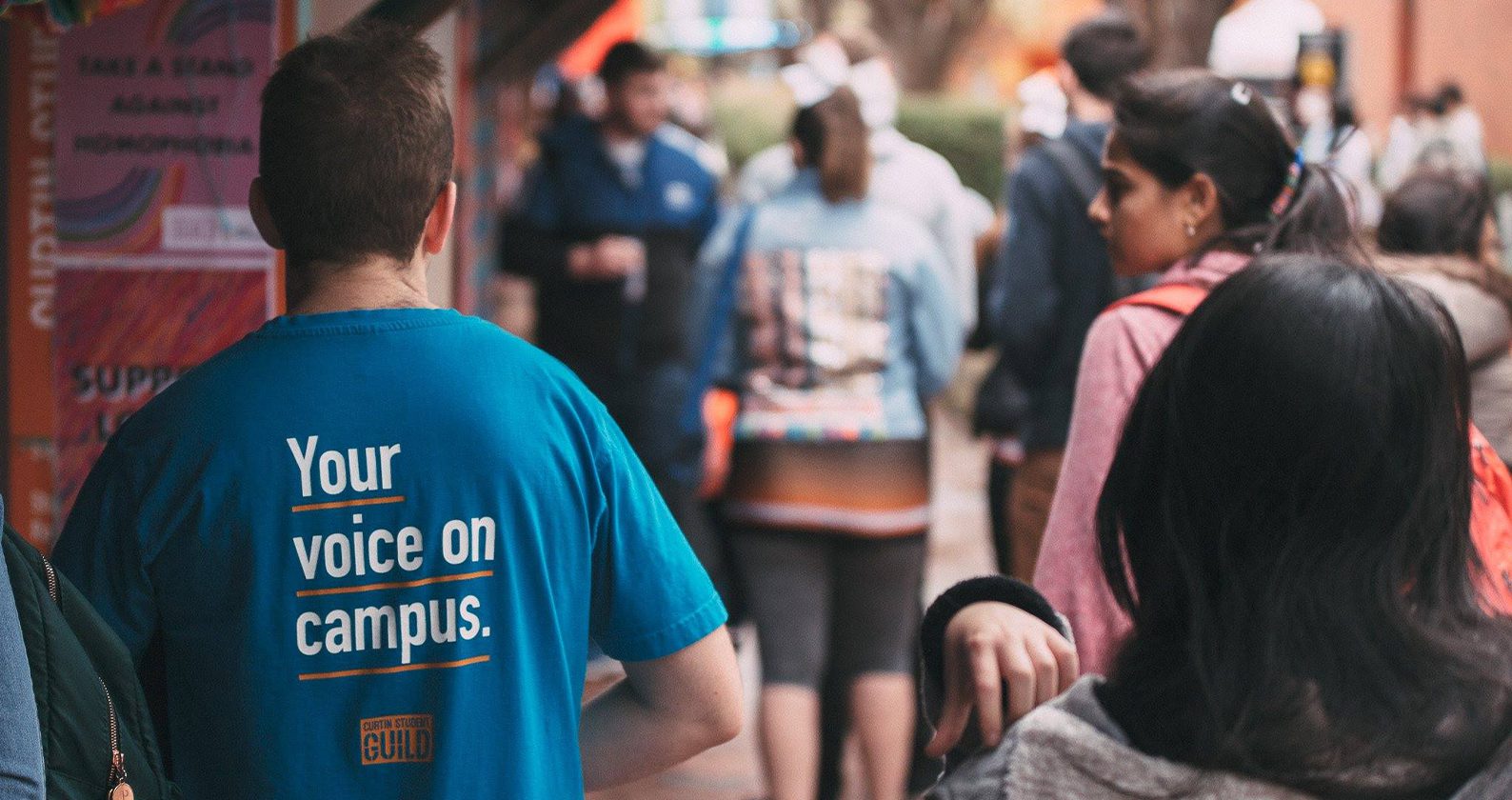 Student guild officer standing in a crowd