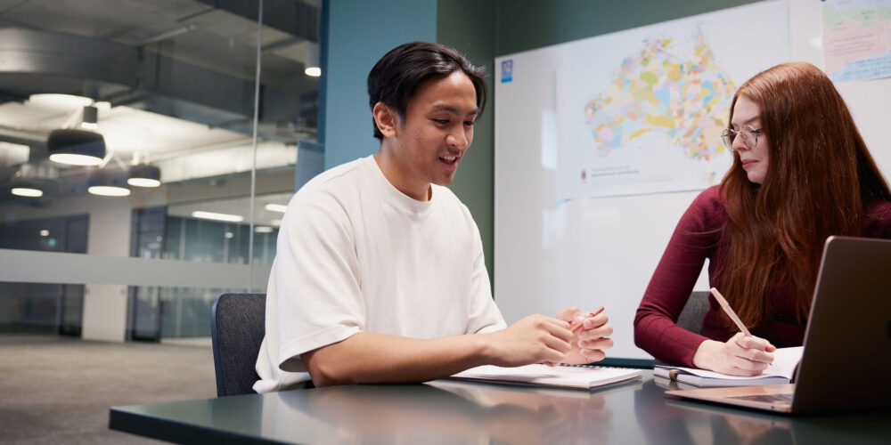 Student talking to a Peer Academic Mentor