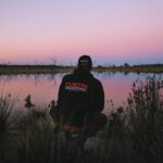Cv! volunteer near a lake