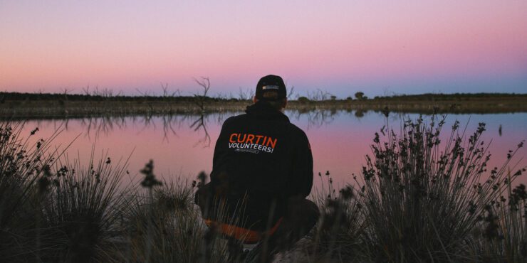 Cv! volunteer near a lake