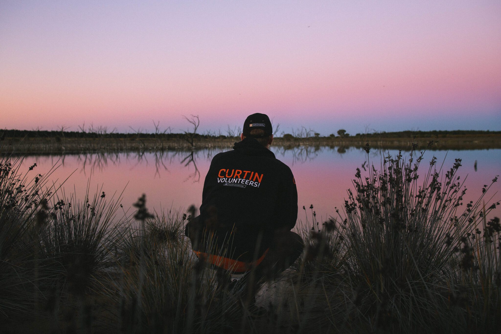 Cv! volunteer near a lake