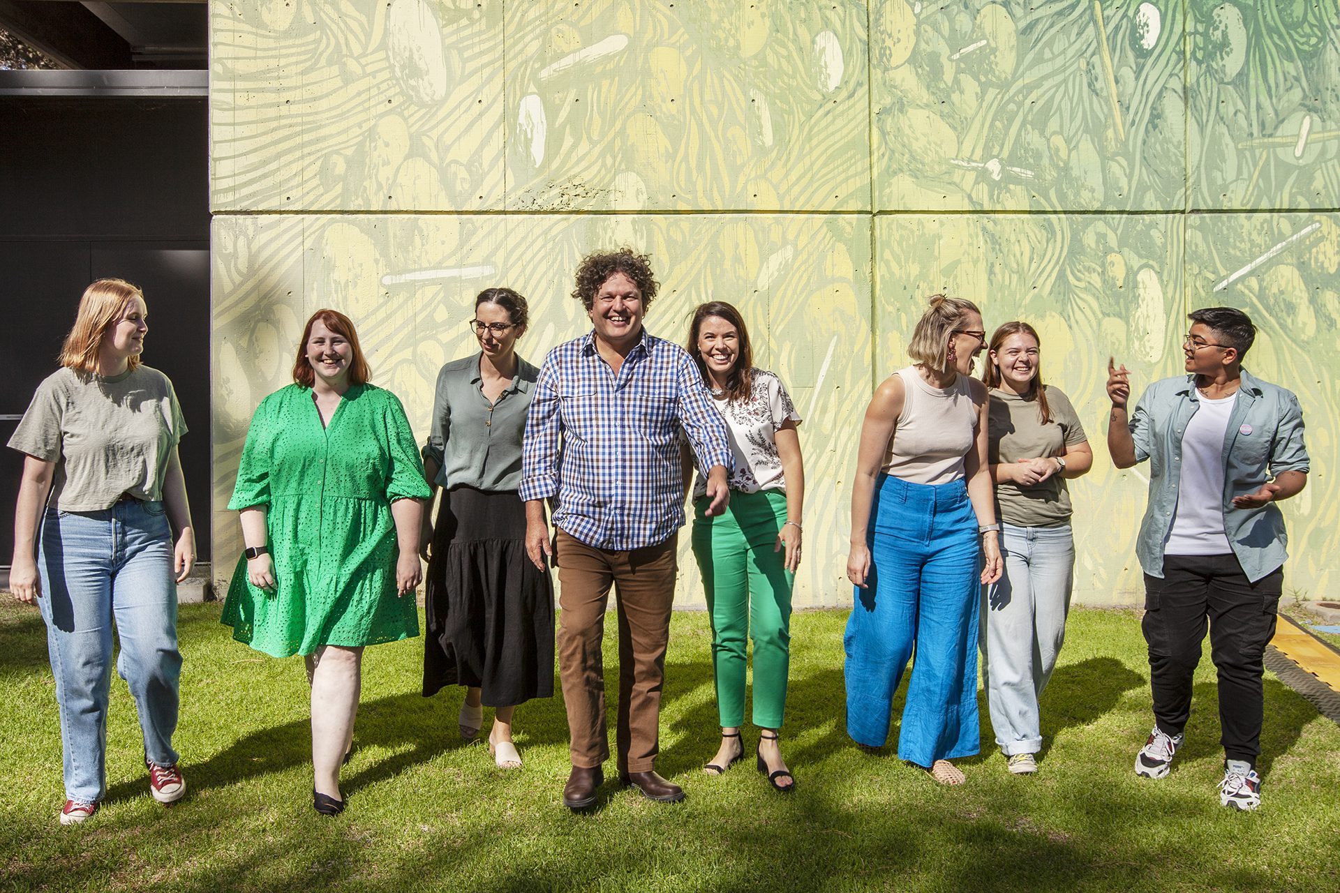 Planet Positive students and lecturers walking towards the camera