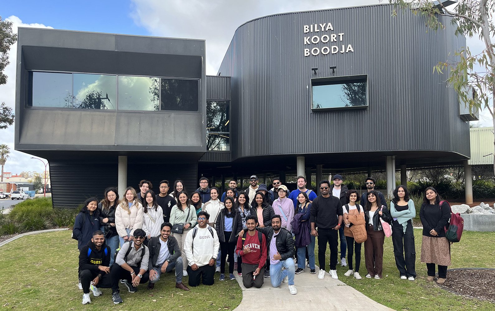 FBL international students take a group photo outside of the Bilya Koort Boodja building.