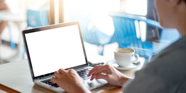 Man uses a laptop for remote working