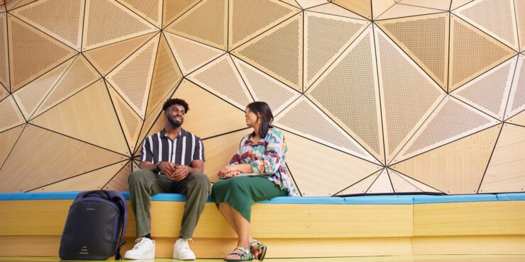 Two students sitting on campus