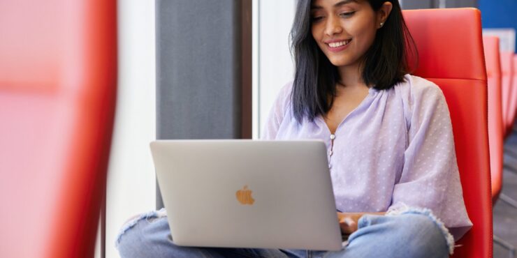 Student working on a laptop.