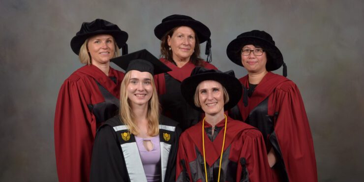 Felicity surrounded by her daughter and supervisors.