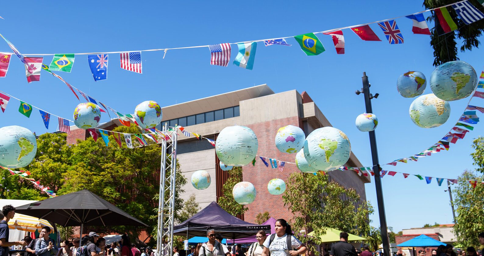 Bunting of flags and inflatable globes.