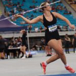 A female athlete throwing a javelin