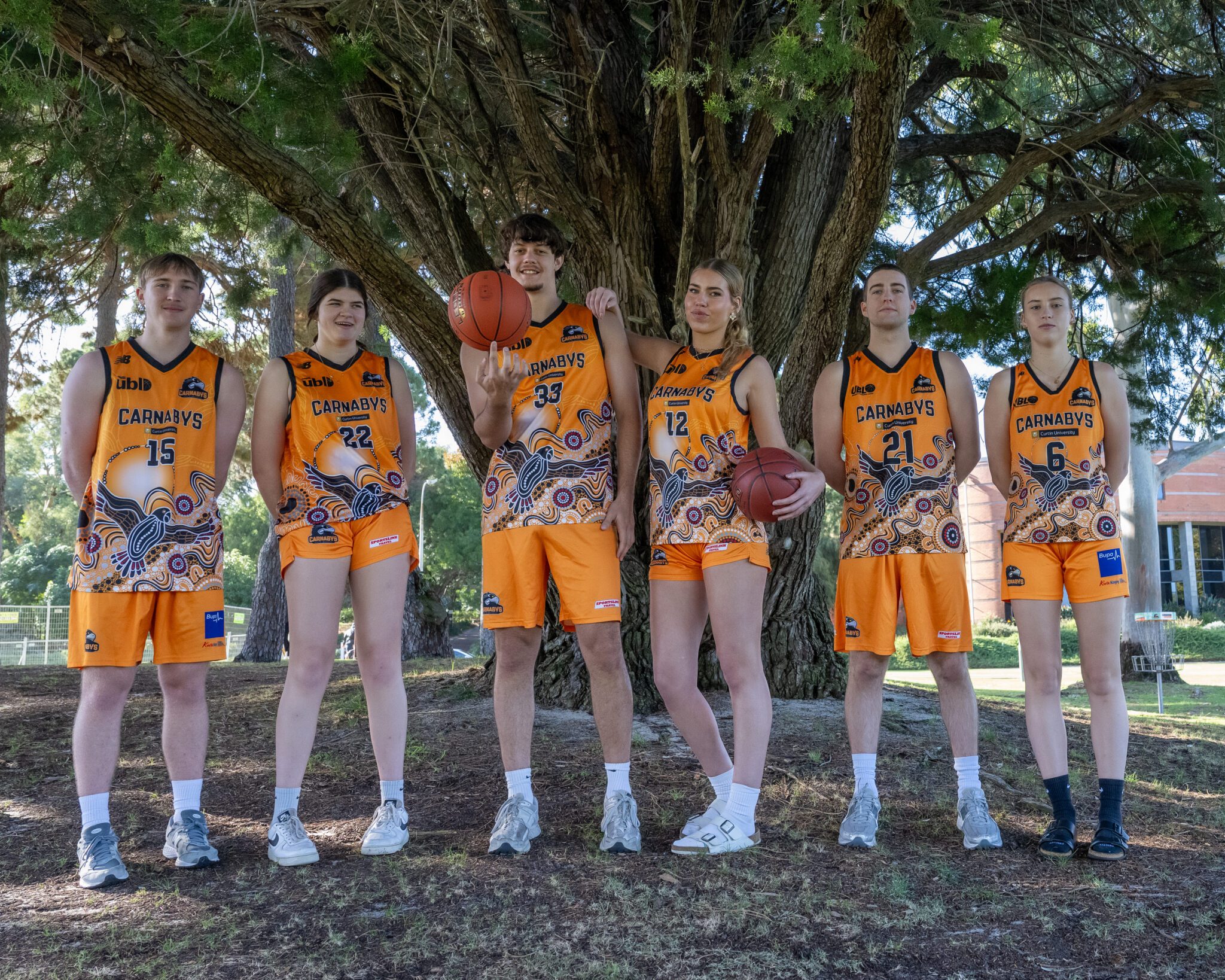 Photograph of six Carnaby players posing for the camera