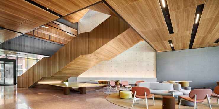 Photograph of inside Curtin's School of Design and the Built Environment, featuring a warm colour pallette.