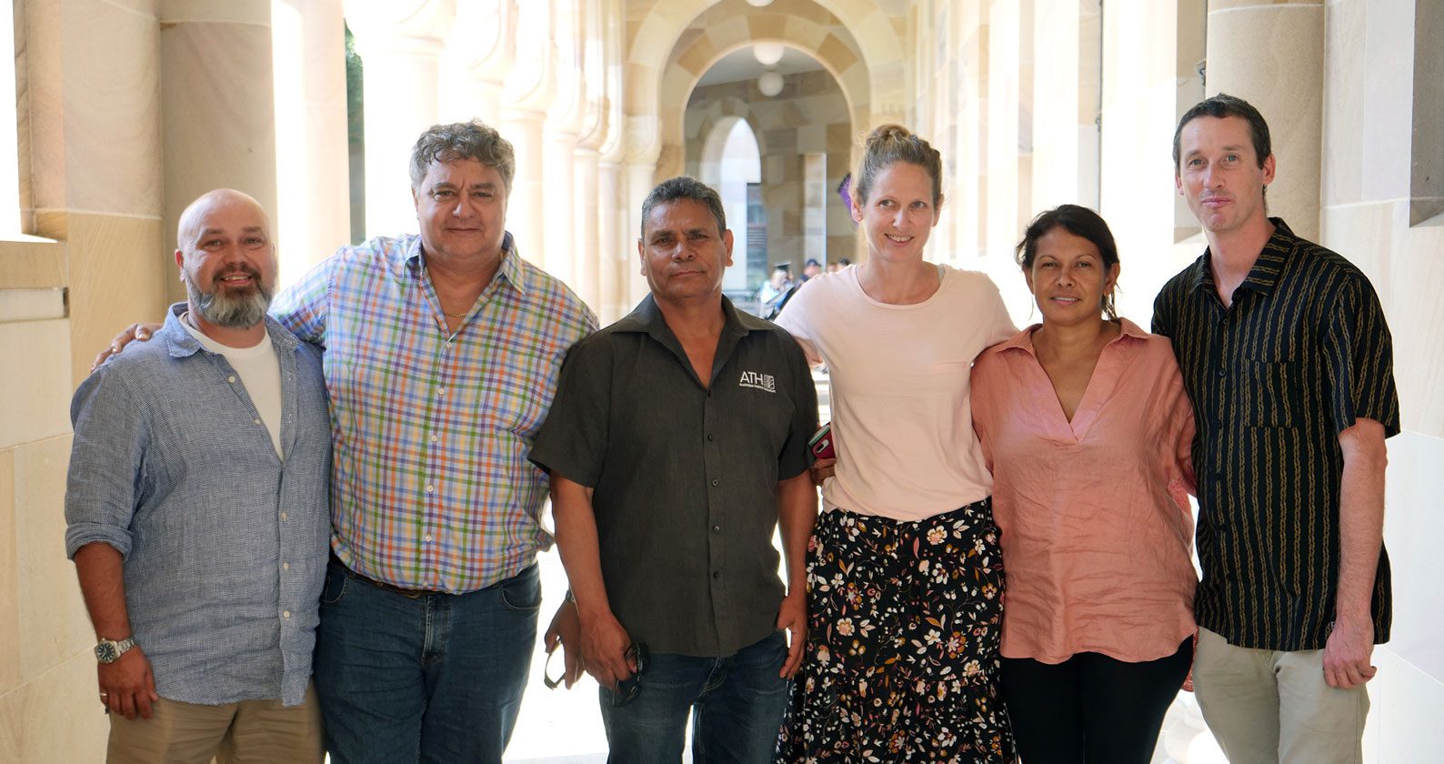 A group of researchers stand together.