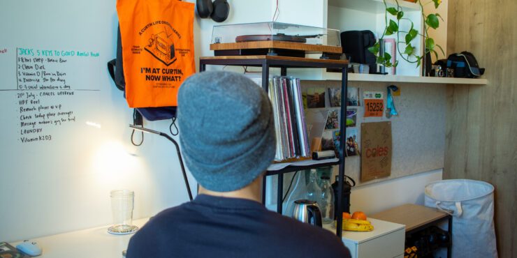 Image of Musa looking onto his room