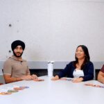 image of Ravish, Aakanksha, Kristel and Musa sitting by the table