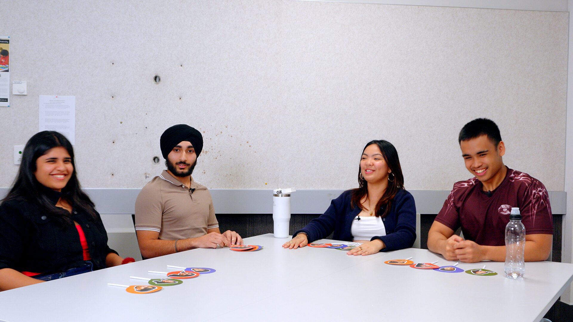 image of Ravish, Aakanksha, Kristel and Musa sitting by the table